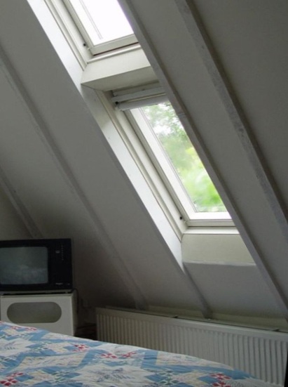 Afb. 06.5.6-1 · Dakraam met radiator en open binnenafwerking
